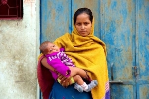 Indian Woman holding her Child