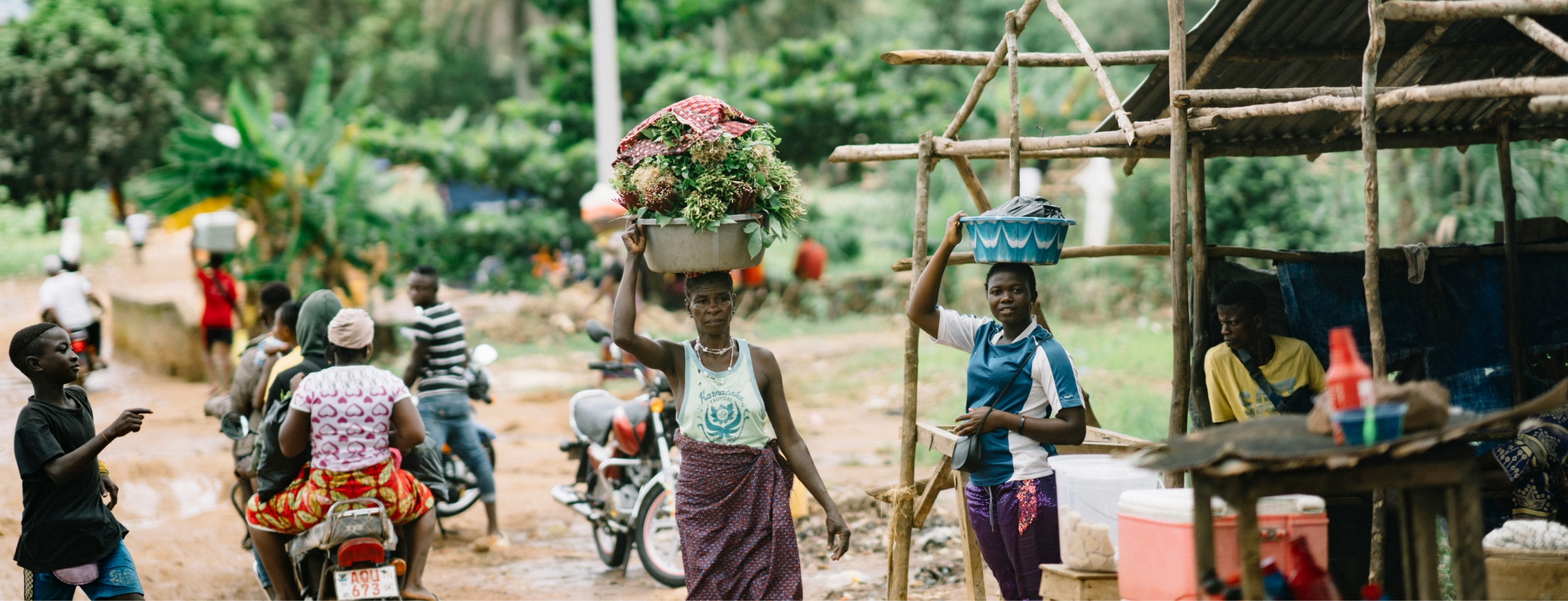 People near a dirt road near Freetown, Sierra Leone.